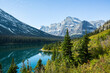 © Tandem Stock - Scenic view of mountain range and Whitefish Lake