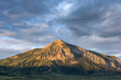 © Tandem Stock - View of mountain against cloudy sky in Mount Crested Butte, Crested Butte, Colorado