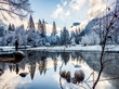 © Tandem Stock - Rear view of man looking at snow covered landscape in winter