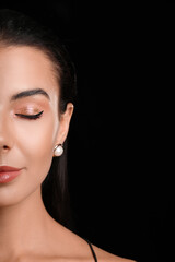 Poster - Young woman with beautiful eyeshadows on dark background