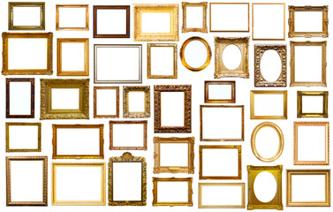 assortment of golden and silvery art and photo frames isolated on white background