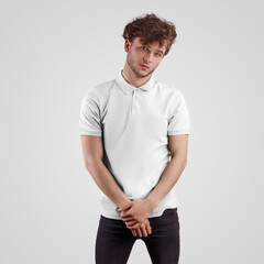 Wall Mural - White polo mockup on young man in black jeans, front view, isolated on background.