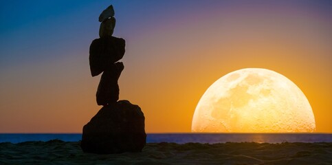 Wall Mural - Zen stones pyramid on the background of the big moon and the sea