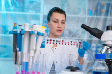 Sticker - Young woman in clinical lab does PCR test on  viral disease