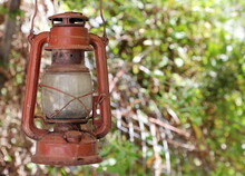 Old Red Oil Lamp Hung In Home Garden