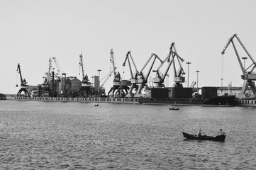 Solitude Anzali's Harbor and two fisherman hunting.