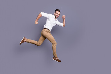 Poster - Full length body size view of his he nice attractive content cheerful cheery man jumping running distance marathon motivation ambition career isolated over grey violet purple pastel color background