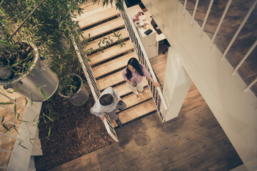 Poster - Top above high angle full length view photo of positive colleagues man woman go downstairs hold coffee cup have rest interesting talk enjoy company climate in workplace workstation