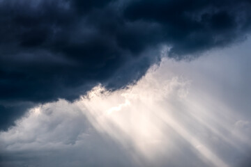 Wall Mural - cloudscape with a light