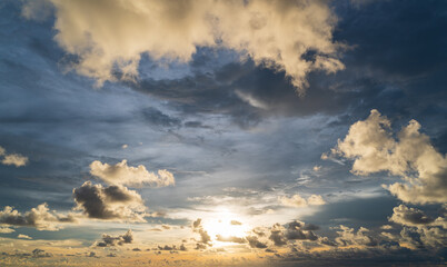 Wall Mural - abstract amazing scene of stuning colorful sunset with clouds background in nature and travel concep