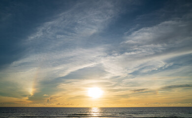 Wall Mural - abstract amazing scene of stuning colorful sunset with clouds background in nature and travel concep