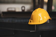 © CStock - Yellow safety helmet on steel structure at construction site,yellow hard safety helmet hat,safety in construction site