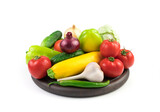 Fototapeta Kuchnia - Assortment of various fresh vegetables on a white background on a wooden Board. Side view. The concept of natural products, proper nutrition.