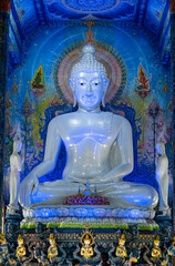 Wall Mural - Chiangrai, Thailand - September 02, 2020: Big White Buddha Image located in Main Blue Chapel of Wat Rong Suea Ten Temple, The Blue Temple, landmark of Chiangrai Province