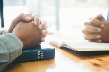 Wall Mural -  Two men praying for each other.