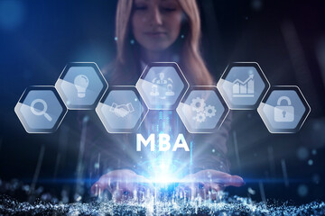 Business, Technology, Internet and network concept. Young businessman working on a virtual screen of the future and sees the inscription: MBA