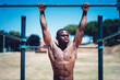 © Cavan Images - young african man doing sport outdoors in the park