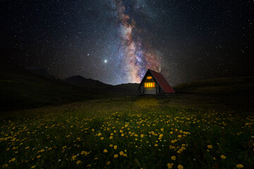 Wall Mural - cabin on the mountain with a starry sky