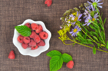 ripe and juicy raspberry berry. the concept of a summer crop, diet, vegetarian food.ecological products from the garden