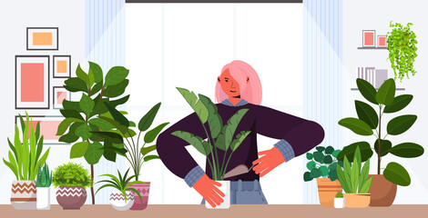 Poster - woman planting houseplants in pot housewife caring of her plants portrait horizontal vector illustration