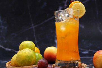 Poster - chill orange juice with ice on table and summer drinking