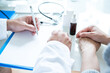 © Coolpicture - Medication - doctor in his office. Close-up of hand.