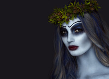 Portrait Of A Horrible Scary Corpse Bride In Wreath With Dead Flowers, Halloween Makeup