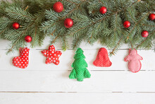 Christmas And New Year Background. Fir Tree Branches With Red Christmas Balls On White Wooden Background