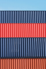 Wall Mural - Colorful stack pattern of cargo shipping containers in shipping yard for import,export industrial