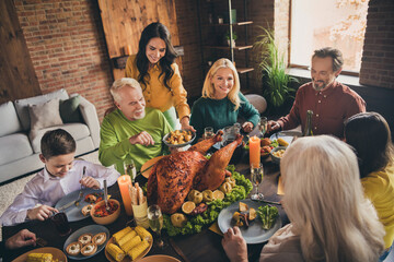 Sticker - Portrait of nice attractive cheerful adorable family parents grandparents grandchildren eating enjoying homemade turkey meal dish at modern loft brick industrial interior indoors