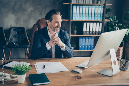 Portrait of his he nice attractive handsome cheerful man ceo boss chief employer meeting online interview hiring candidate vacancy at modern concrete industrial work place station