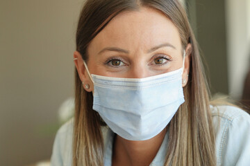 Wall Mural - Portrait of european woman with face protection mask