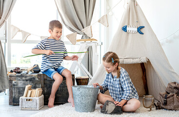 Wall Mural - Children catching fish with rod