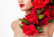 © Svetlana Fedoseeva - Beautiful woman face surrounded by red roses. Perfect skin. Professional makeup.