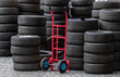 Folded car tires in a tire service. Replacing tires in a car service. Tire fitting and vulcanization
