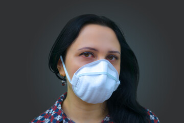 Portrait of young female. European woman wearing a face mask,  isolated on color background.