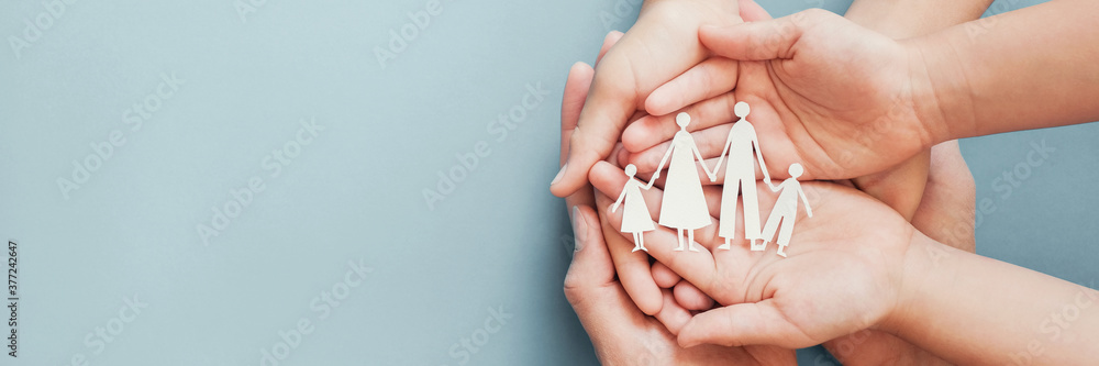 Adult and children hands holding paper family cutout, family home, foster care, homeless charity support concept, family mental health, international day of families - obrazy, fototapety, plakaty 