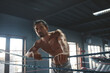 © puhhha - Fitness Man On Boxing Ring. Portrait Of Shirtless Sportsman With Muscular Torso Posing At Gym. Handsome Topless Asian Guy With Strong Body Looking At Camera.