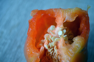 A piece of multi-colored bell pepper seeds. Vegetables, vegetarianism.