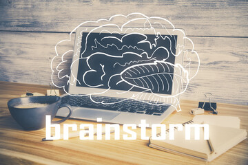 Desktop computer background in office and start up theme hologram drawing. Double exposure. Startup concept.