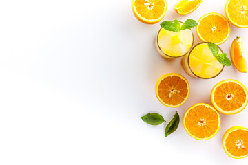 Glass of orange juice healthy drink on a white background top view copy space