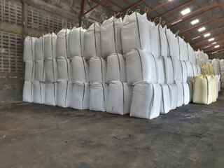 Stock pile Chemical fertilizer jumbo-bag in warehouse waiting for shipment.