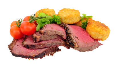 Wall Mural - Sliced roasted pepper and salt covered beef rump beef with tomatoes and potato rosti isolated on a white background