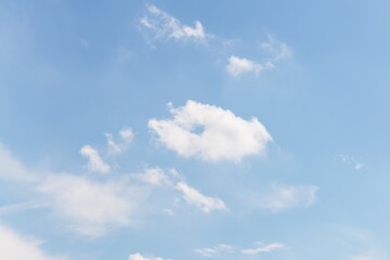 Wall Mural - Light blue sky with delicate small clouds, sky background