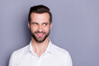 © deagreez - Portrait of charming charismatic real estate agent man marketer chief look copyspace listen colleagues conversation feel curious wear stylish outfit isolated over gray color background