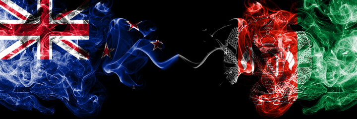 New Zealand vs Afghanistan, Afghani smoky mystic flags placed side by side. Thick colored silky abstract smoke flags