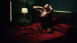 © stockbusters - Passionate woman touching hair silk bed. Sexy lingerie girl posing in bedroom.