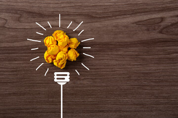 Creative idea, Inspiration, New idea and Innovation concept with Crumpled Paper light bulb