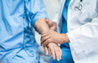 © amazing studio - Doctor holding touching hands Asian senior or elderly old lady woman patient with love, care, helping, encourage and empathy at nursing hospital ward, healthy strong medical concept