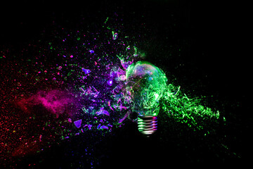 Wall Mural - Traditional light bulb that explodes